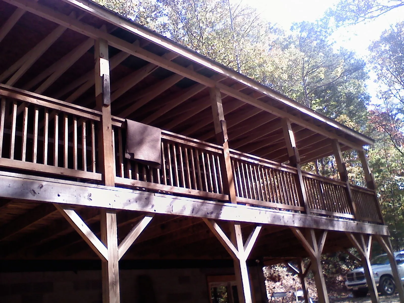 Timber framing under a new elevated porch and deck — Roof Leak Repair in Henrieville by Roofing Brothers